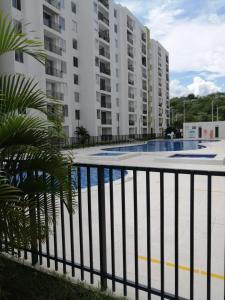 a view from the balcony of a apartment building at Apartamento vacacional amplio, cómodo y tranquilo. in Ricaurte