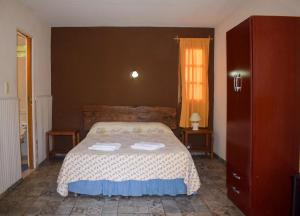 Postel nebo postele na pokoji v ubytování Complejo Los Molles