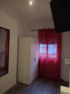 TV a/nebo společenská místnost v ubytování Avenue Rooms