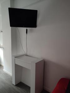 TV a/nebo společenská místnost v ubytování Avenue Rooms