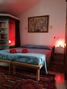 Giường trong phòng chung tại Casa Perni