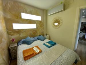 Postel nebo postele na pokoji v ubytování Coqueto apartamento céntrico