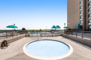 a swimming pool on top of a building at Sea Colony Brandywine Garden in Bethany Beach