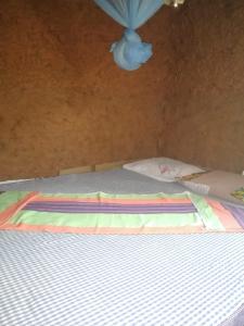 Letto o letti in una camera di Bimanjee Mango Resort