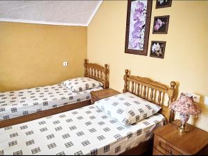 En eller flere senger på et rom på Guest house Chetyre podkovy