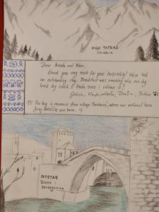 a drawing of a bridge with mountains in the background at Apartment Mostar in Mostar