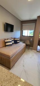 TV/trung tâm giải trí tại Porto Praia Resort Marulhos