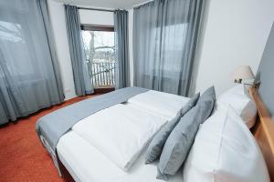 Postel nebo postele na pokoji v ubytování Coffee Fellows Hotel Trier