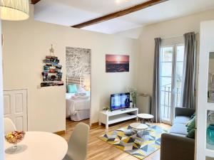 Televízia a/alebo spoločenská miestnosť v ubytovaní Precioso apartamento en el Casco Vello de Vigo