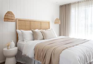 Postel nebo postele na pokoji v ubytování Loea Boutique Hotel