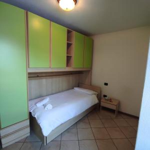 Postel nebo postele na pokoji v ubytování Orobie Holiday Apartments