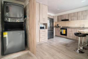 Una cocina o zona de cocina en Modern, Luxurious and Tradicional Apartments by Samilis Place