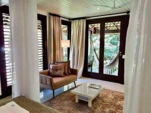Posezení v ubytování Mangueira Boutique Hotel Moreré