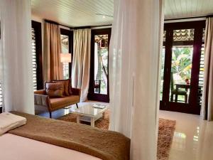 Postel nebo postele na pokoji v ubytování Mangueira Boutique Hotel Moreré