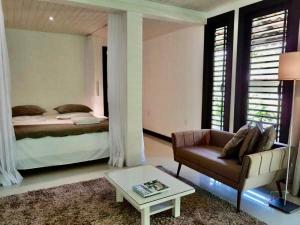 Postel nebo postele na pokoji v ubytování Mangueira Boutique Hotel Moreré