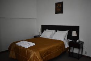 Postel nebo postele na pokoji v ubytování Pukara House