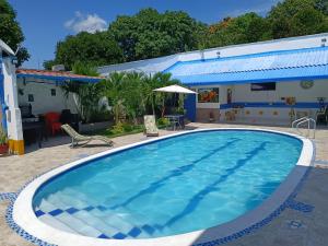 A piscina localizada em Casa Hotel Victoria Real ou nos arredores
