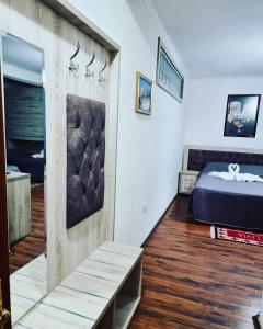 Postel nebo postele na pokoji v ubytování Hotel Livia