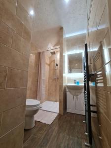 O baie la 4Br Sea View Escape-Near Snowdonia& Coastal Trails +36 fotografii