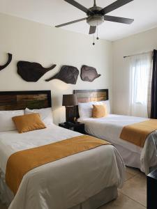 Cama ou camas em um quarto em HOTEL TEKAPA