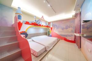 Ein Bett oder Betten in einem Zimmer der Unterkunft Jinduo Family Homestay