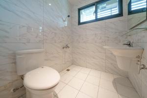 Ein Badezimmer in der Unterkunft Jinduo Family Homestay