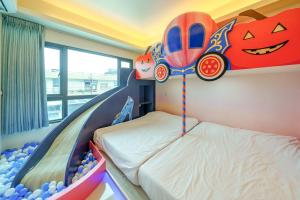 Ein Bett oder Betten in einem Zimmer der Unterkunft Jinduo Family Homestay