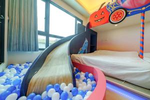Ein Bett oder Betten in einem Zimmer der Unterkunft Jinduo Family Homestay