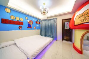 Ein Bett oder Betten in einem Zimmer der Unterkunft Jinduo Family Homestay