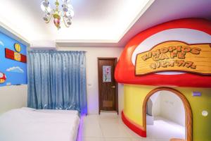 Ein Bett oder Betten in einem Zimmer der Unterkunft Jinduo Family Homestay
