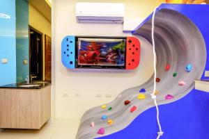 TV/Unterhaltungsangebot in der Unterkunft Jinduo Family Homestay