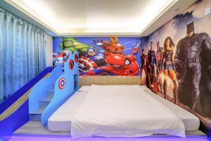Ein Bett oder Betten in einem Zimmer der Unterkunft Jinduo Family Homestay
