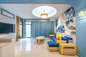 Posezení v ubytování Jinduo Family Homestay