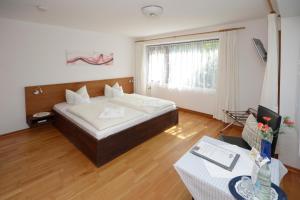 Posteľ alebo postele v izbe v ubytovaní Hotel am Wasserturm