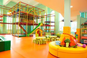 a childrens play area with a slide and a playground at Hotel Montecito in Sofia