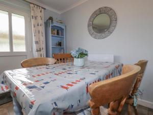 Ένα ή περισσότερα κρεβάτια σε δωμάτιο στο Merryfield Lodge