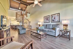 a living room with a couch and a table at Ocean View Kihei Retreat with Resort Amenities! in Wailea