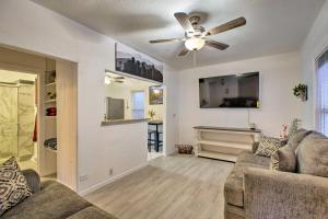 a living room with a couch and a ceiling fan at Beautiful Denver Retreat about 4 Mi to Downtown! in Denver
