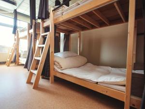 a bunk bed in a small room at Nara Ugaya Guesthouse in Nara