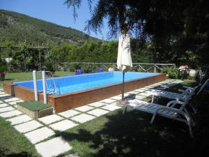 The swimming pool at or close to Agriturismo La Chiana