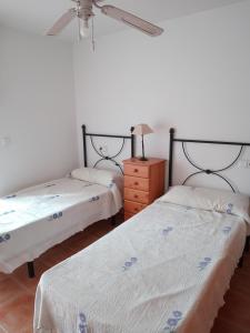Postel nebo postele na pokoji v ubytování Apartamento de Palomares CUEVAS DEL ALMANZORA