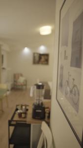 a room with a kitchen with a blender on a counter at City Class Accommodation in Zadar +7 photos
