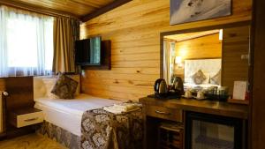 Postel nebo postele na pokoji v ubytování Ayder Hasimoglu Hotel