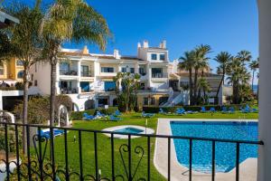a view of the villas from the balcony at L166 Cabopino in Marbella