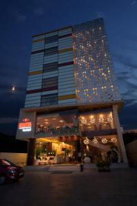 a large building with a sign in front of it at Celesta - Kolkata in Kolkata