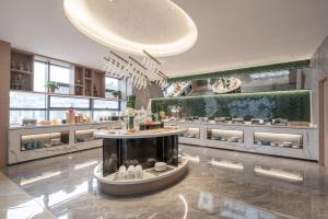 Restaurace v ubytování 银座佳悦精选酒店冠县冠宜春路店