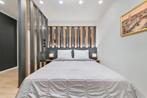 מיטה או מיטות בחדר ב-Villa Madison