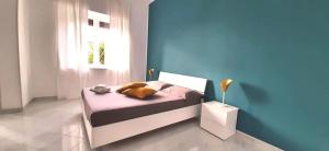 Posteľ alebo postele v izbe v ubytovaní A Due Passi dal Mare B&B