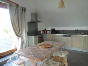 A kitchen or kitchenette at Belle vue sur mer