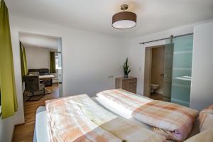 A bed or beds in a room at Cafe Max